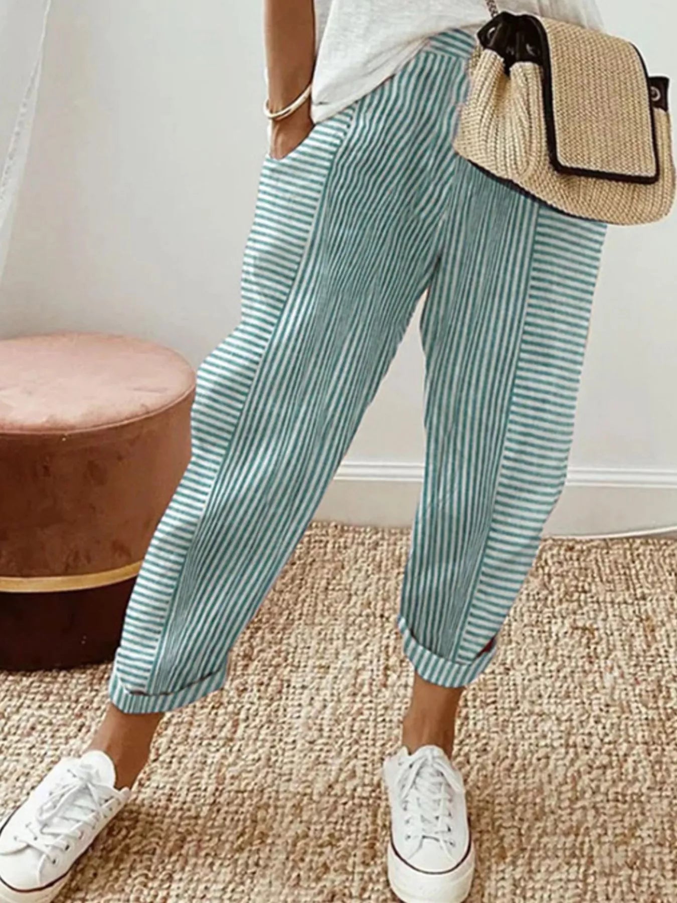 Striped casual pants with pockets, light green and white vertical stripes, ankle cuffs