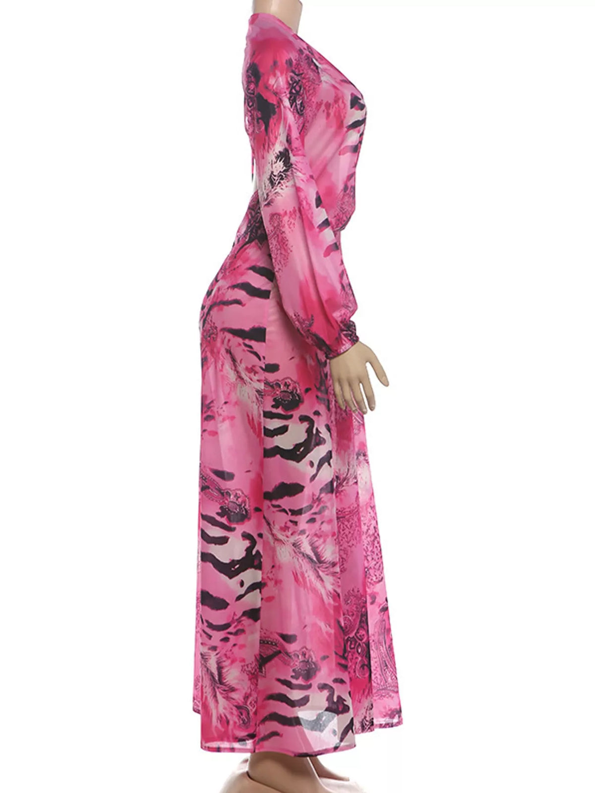 Pink printed maxi dress with deep V neckline and long sleeves, side view