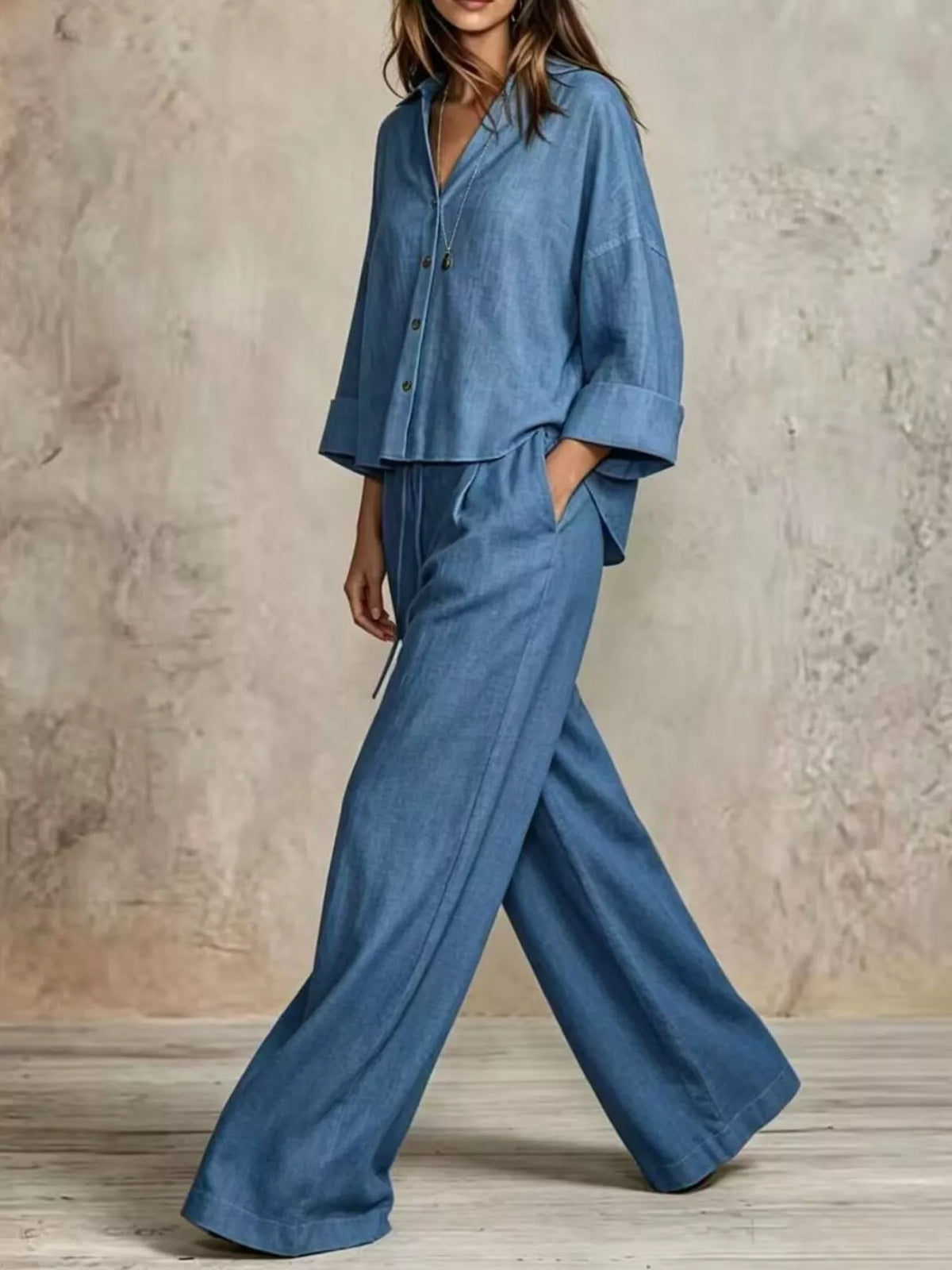 Blue wide leg button-down shirt and pants set, V-neck style with buttons