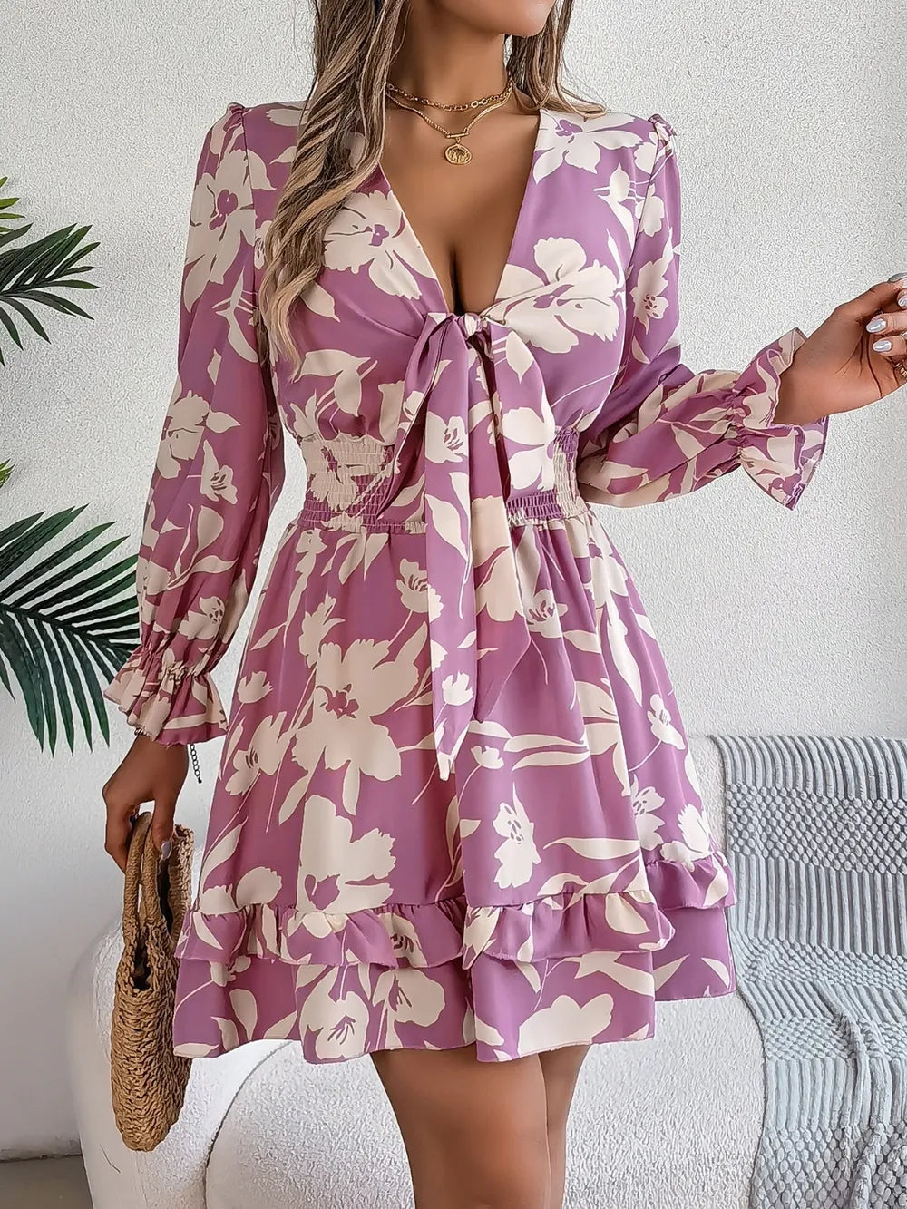 Lilac floral long-sleeve dress with tied V-neck and ruffled tiered skirt