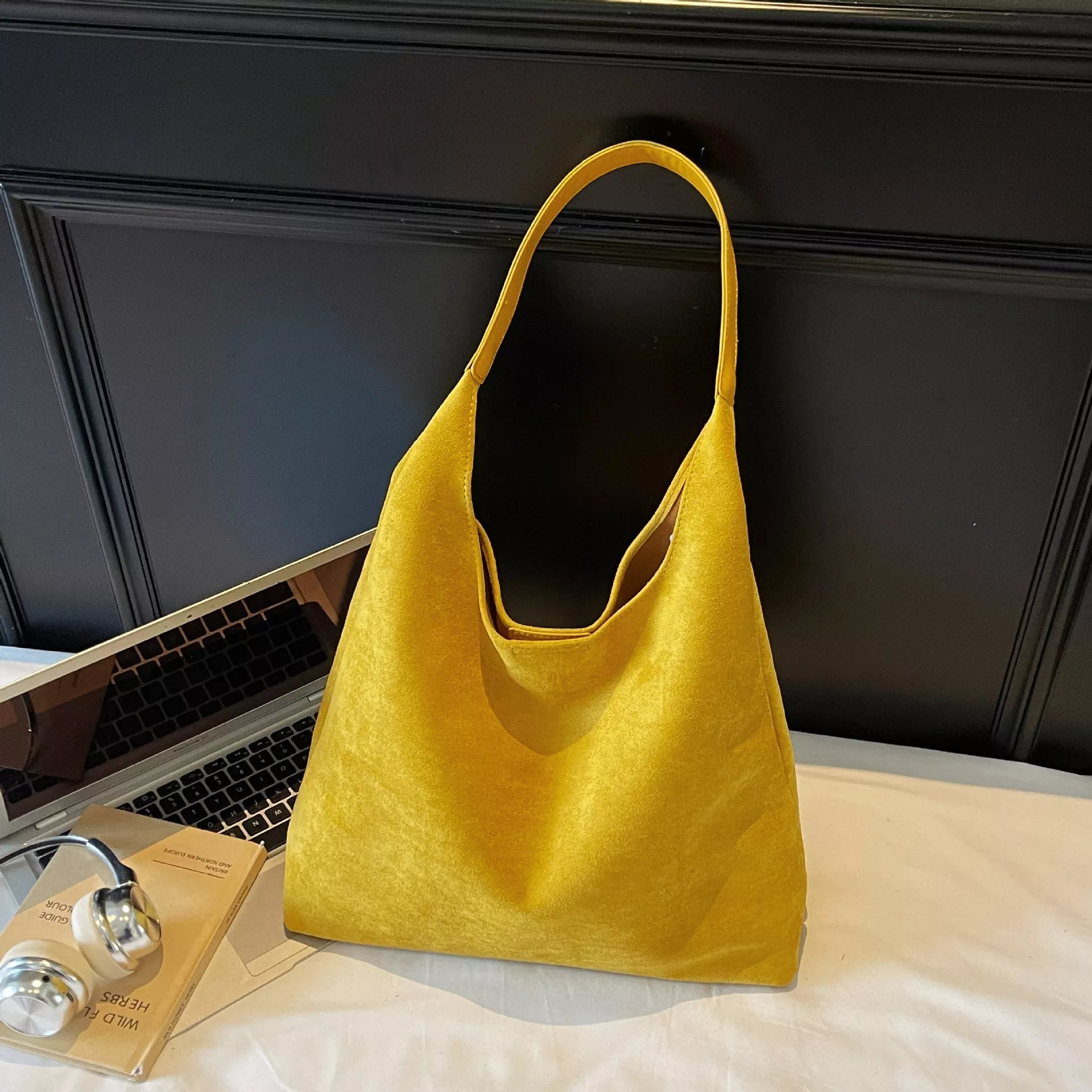 Yellow shoulder bag with wide handle and open top