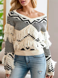 Beige and black geometric knit V-neck sweater with fringe hem and cuffs