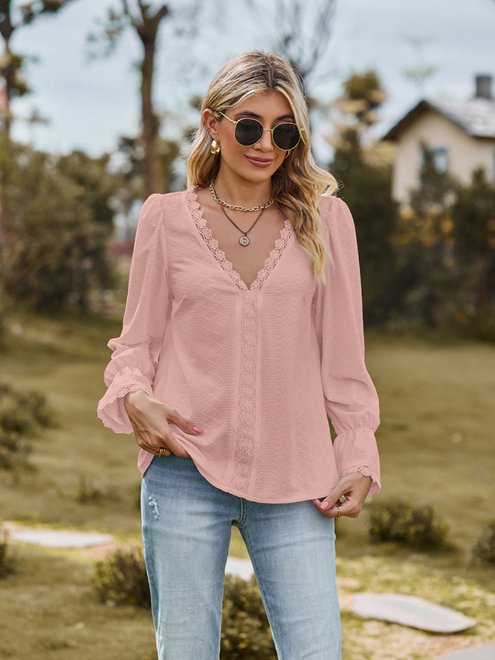 Flounce-sleeve blouse in blush pink, V-neck with lace trim and long flounce sleeves