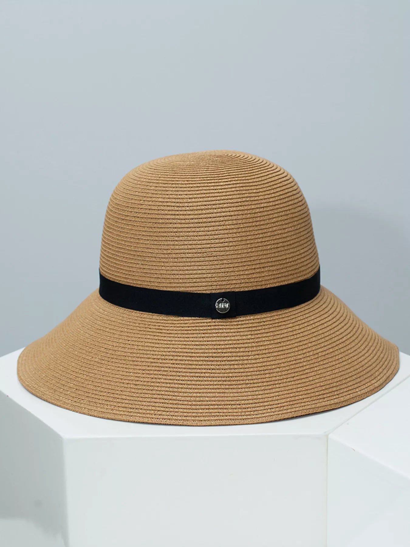 Cedar & Moore Trendsi straw sun hat with black ribbon band, tan color.