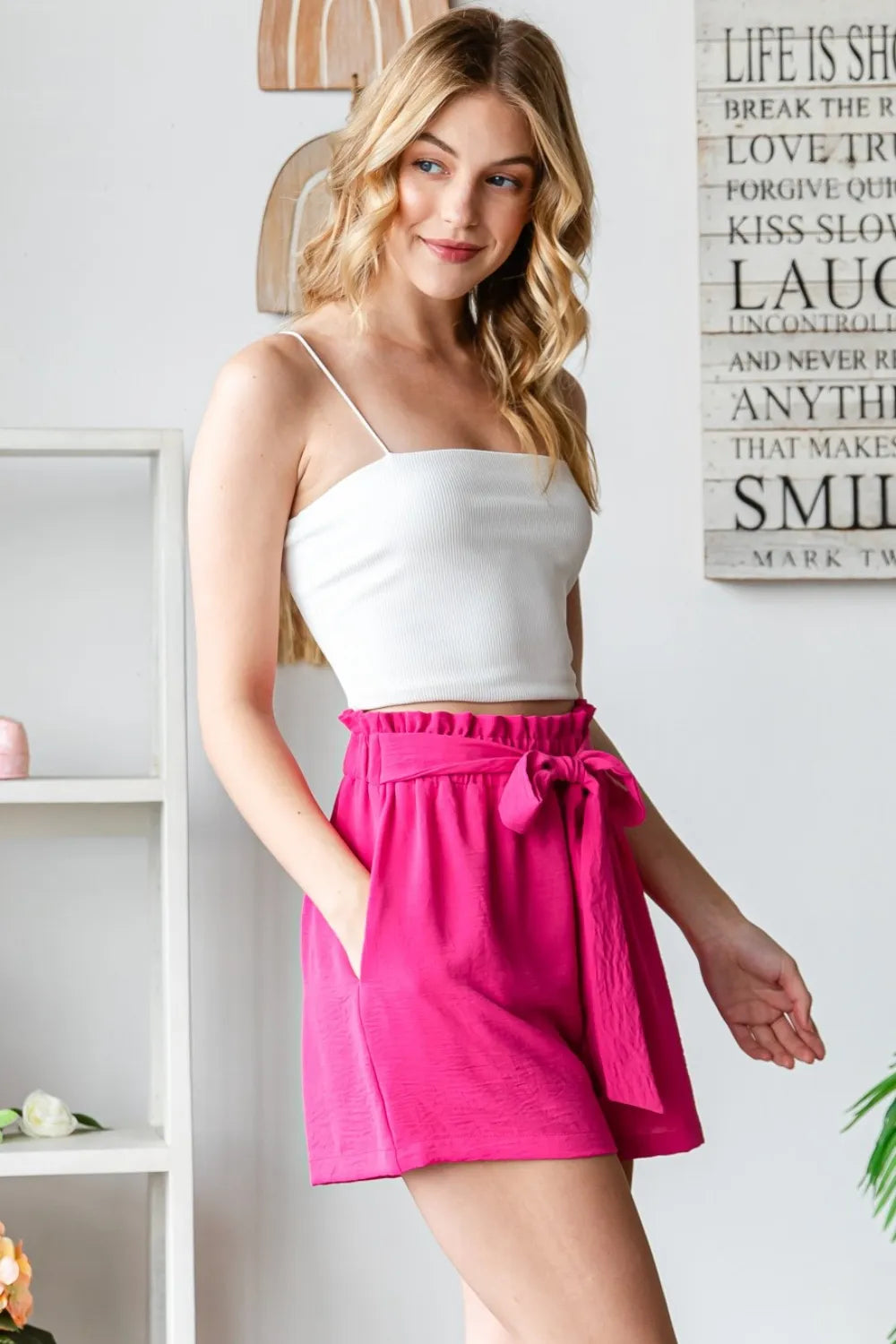 Fuchsia high-waist tied texture shorts with thin straps and front tie detail