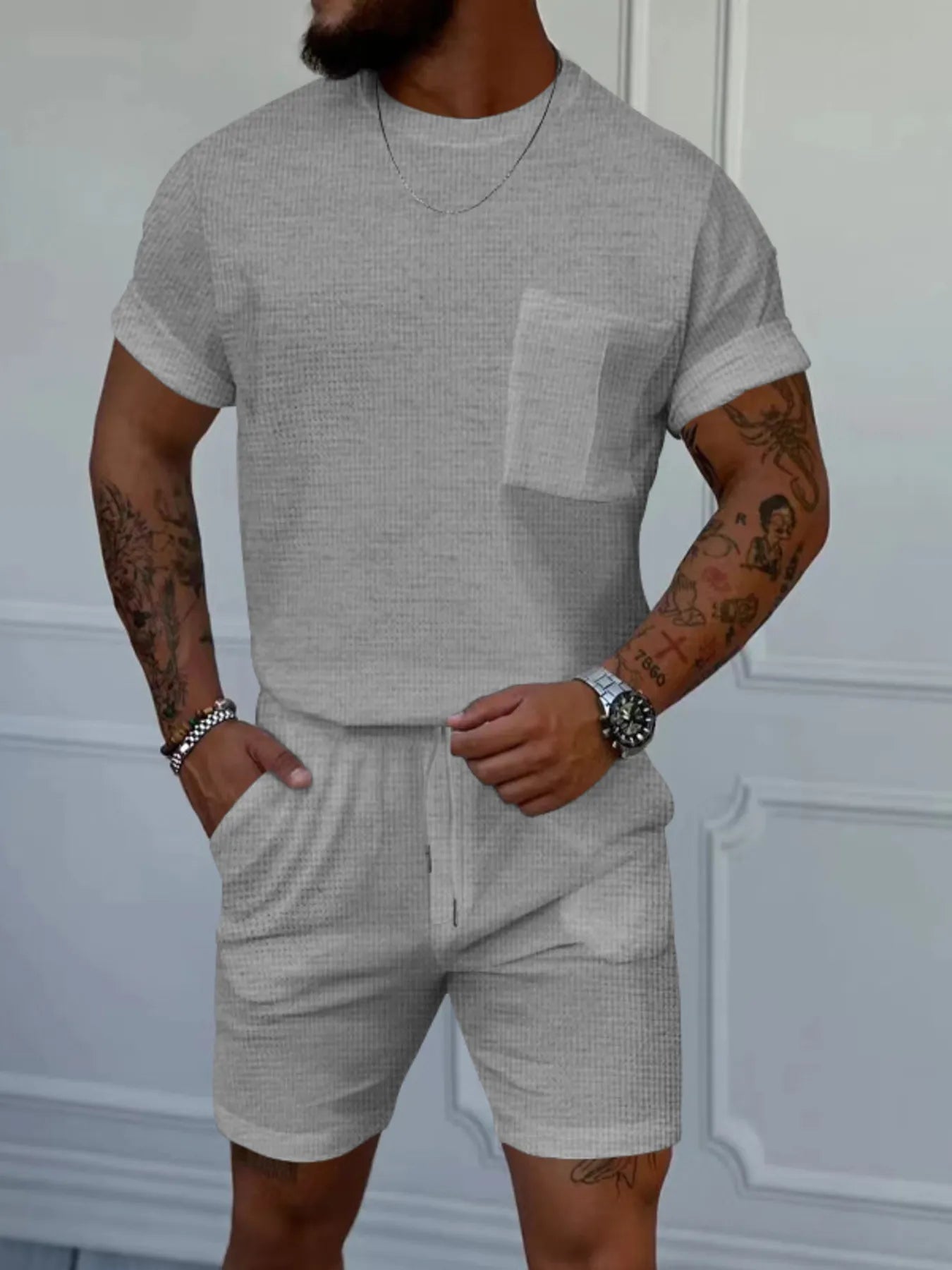 Men's gray short-sleeve round-neck top and shorts set with chest pocket