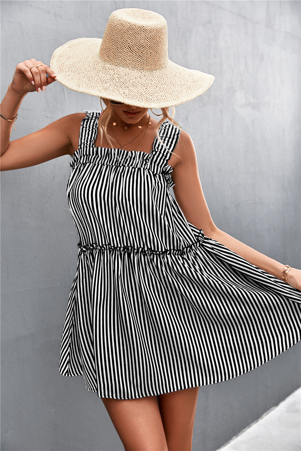 Black and white striped square-neck dress with frilled straps and gathered waist