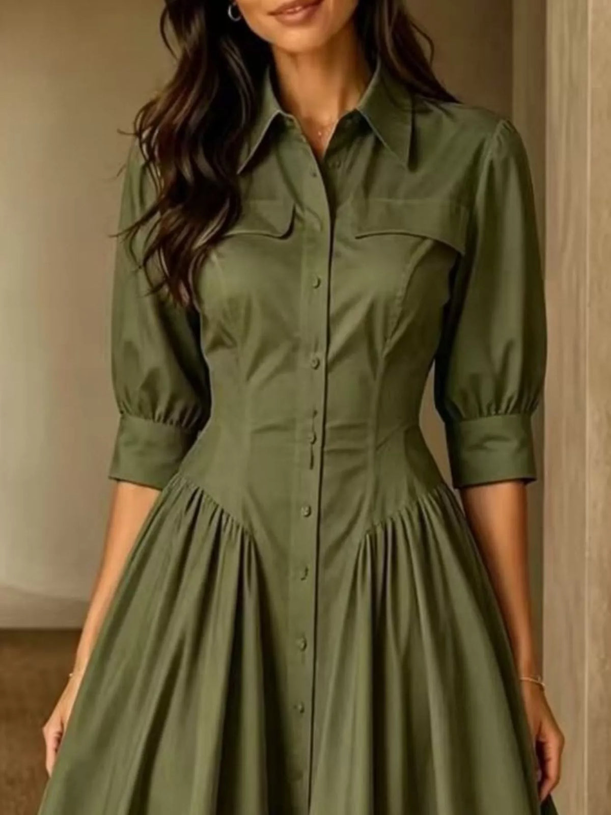 Army green button-down shirt dress close-up with chest pocket and gathered waist