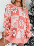Burnt coral and white checkerboard snowflake sweater with drop shoulder and ribbed cuffs