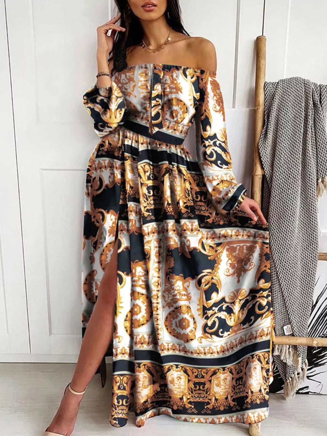Black, gold, and tan baroque printed off-shoulder maxi dress with side slit