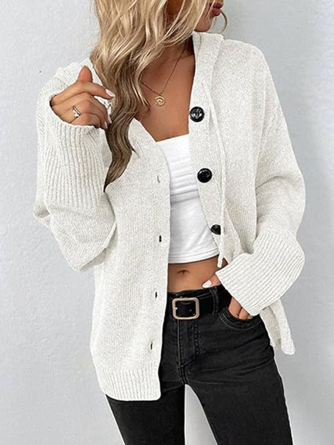 White hooded button cardigan sweater with long sleeves and front buttons