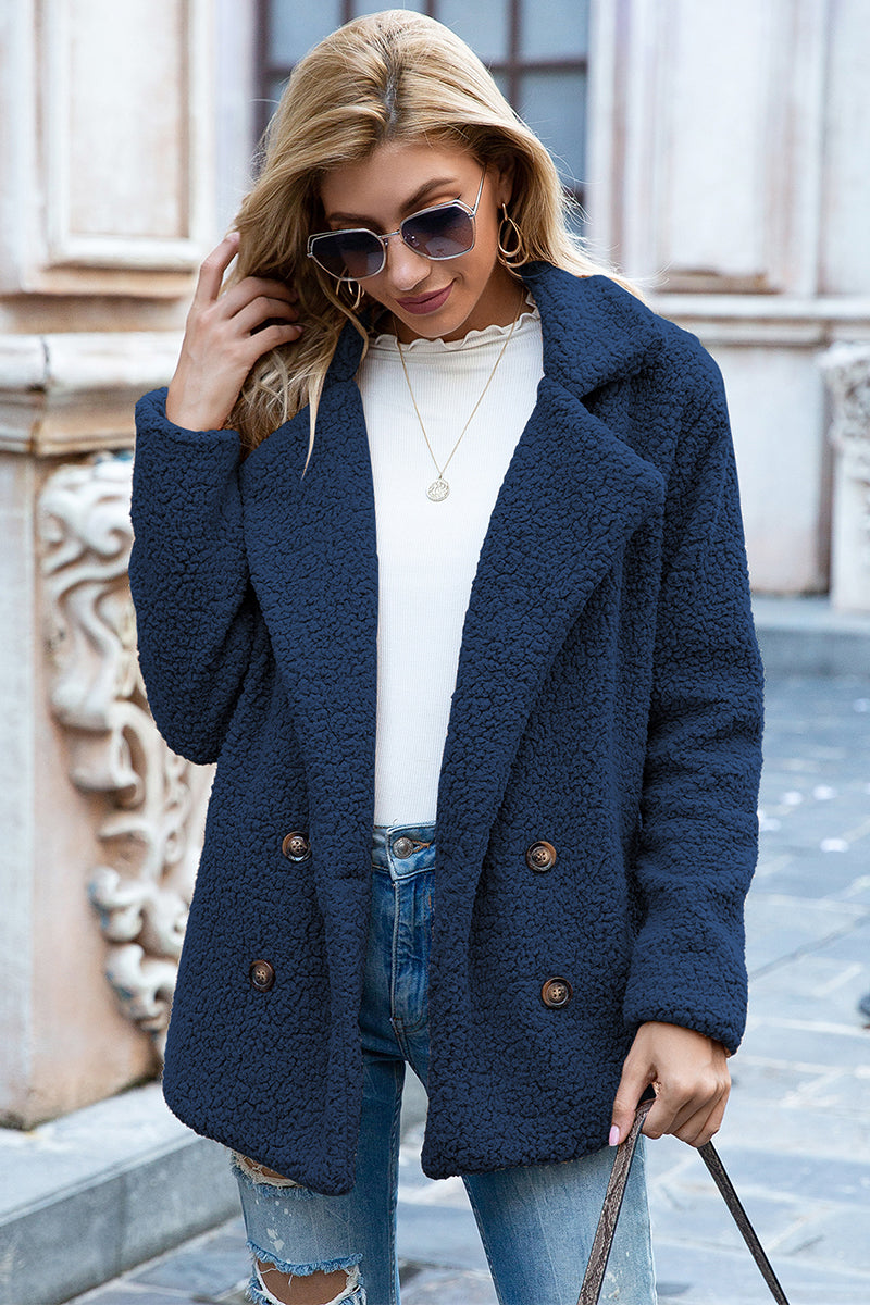 Sherpa lapel collar coat in deep blue with double-breasted buttons, long sleeves