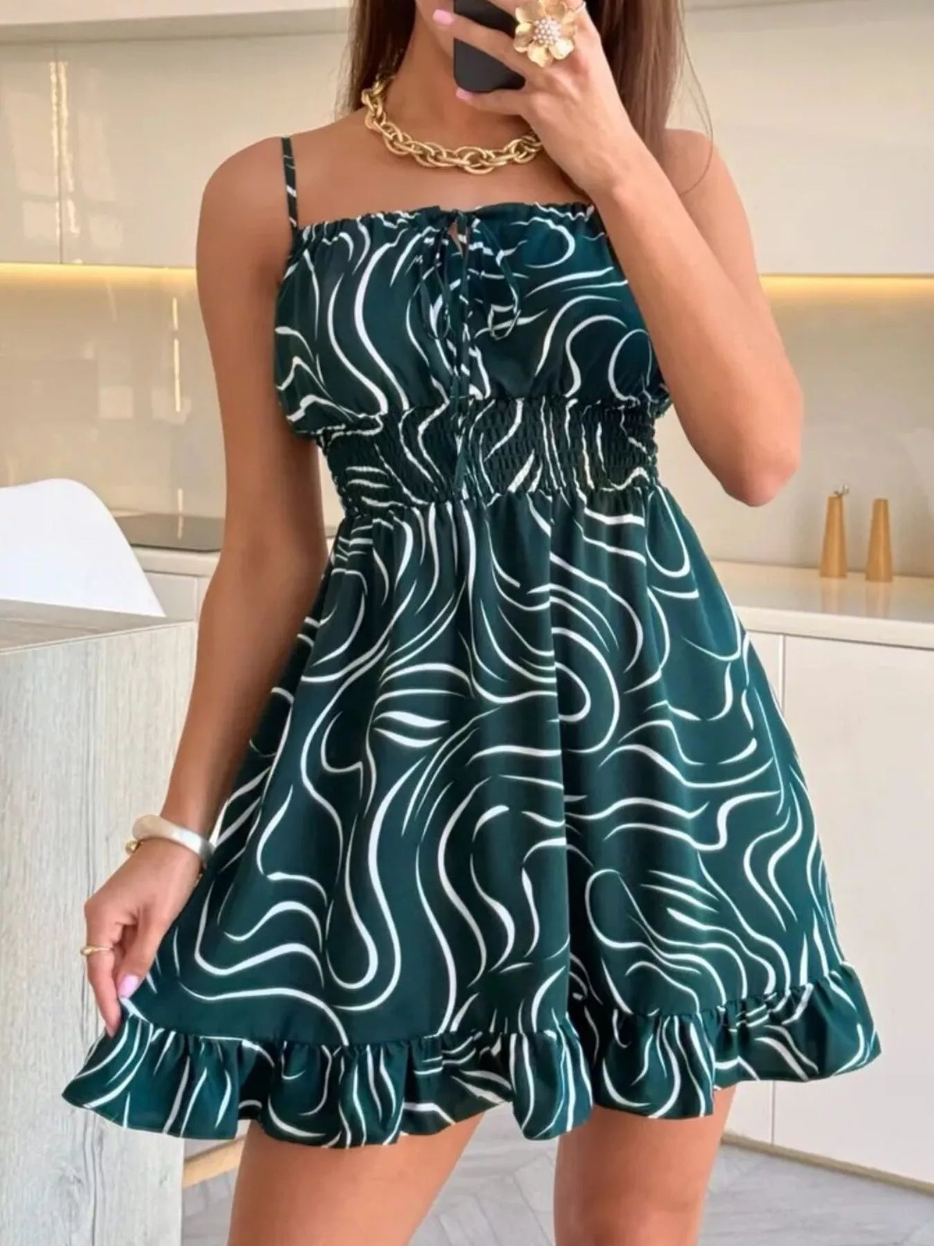 Ruffle-hem spaghetti strap mini dress with ruched waist, dark teal and white abstract print