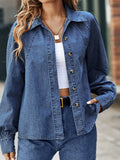 Blue denim button-up long sleeve shirt with pointed collar and front button placket