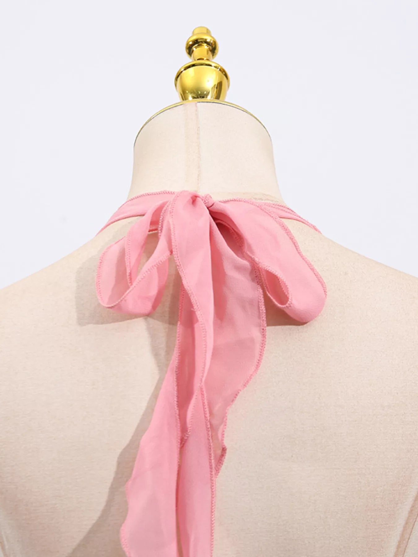 Cedar & Moore Sequin Halter Neck Mini Dress back view with pink satin tie