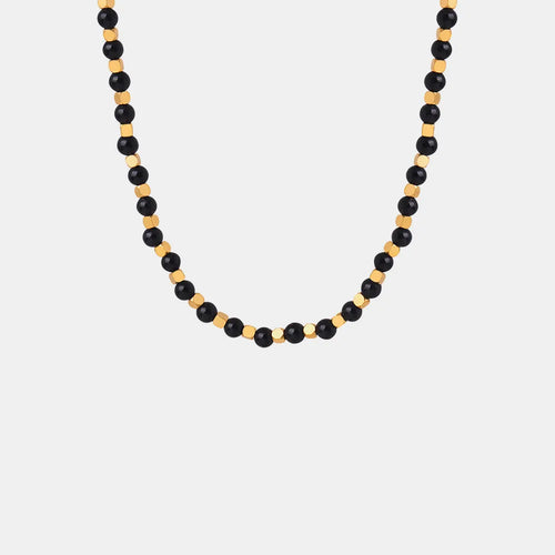 Agate beaded necklace with black beads and gold-tone accents, full front view