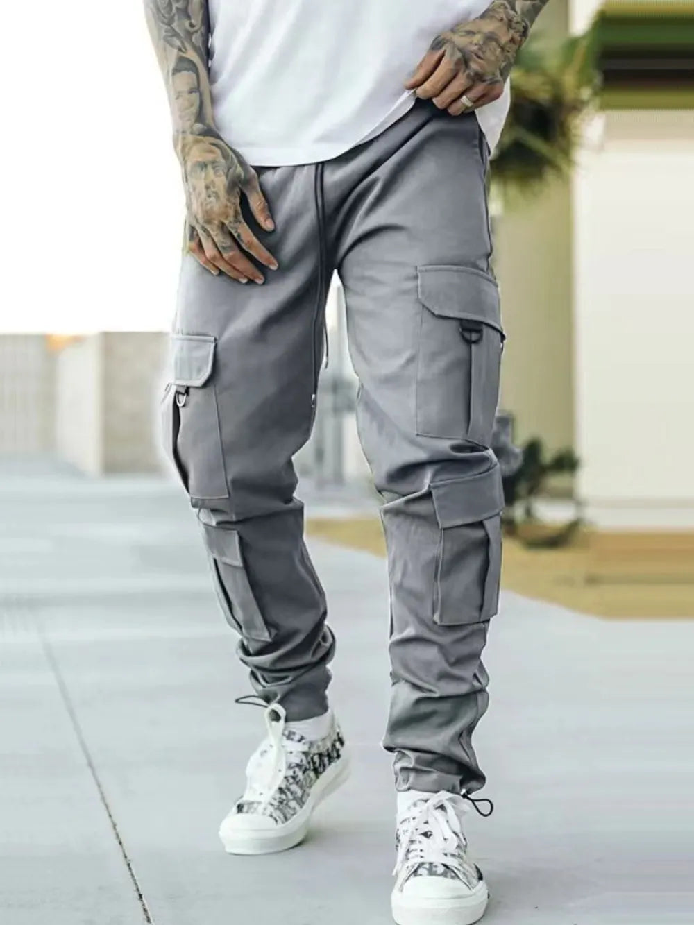 Men's gray cargo pants with drawstring waist and side cargo pockets
