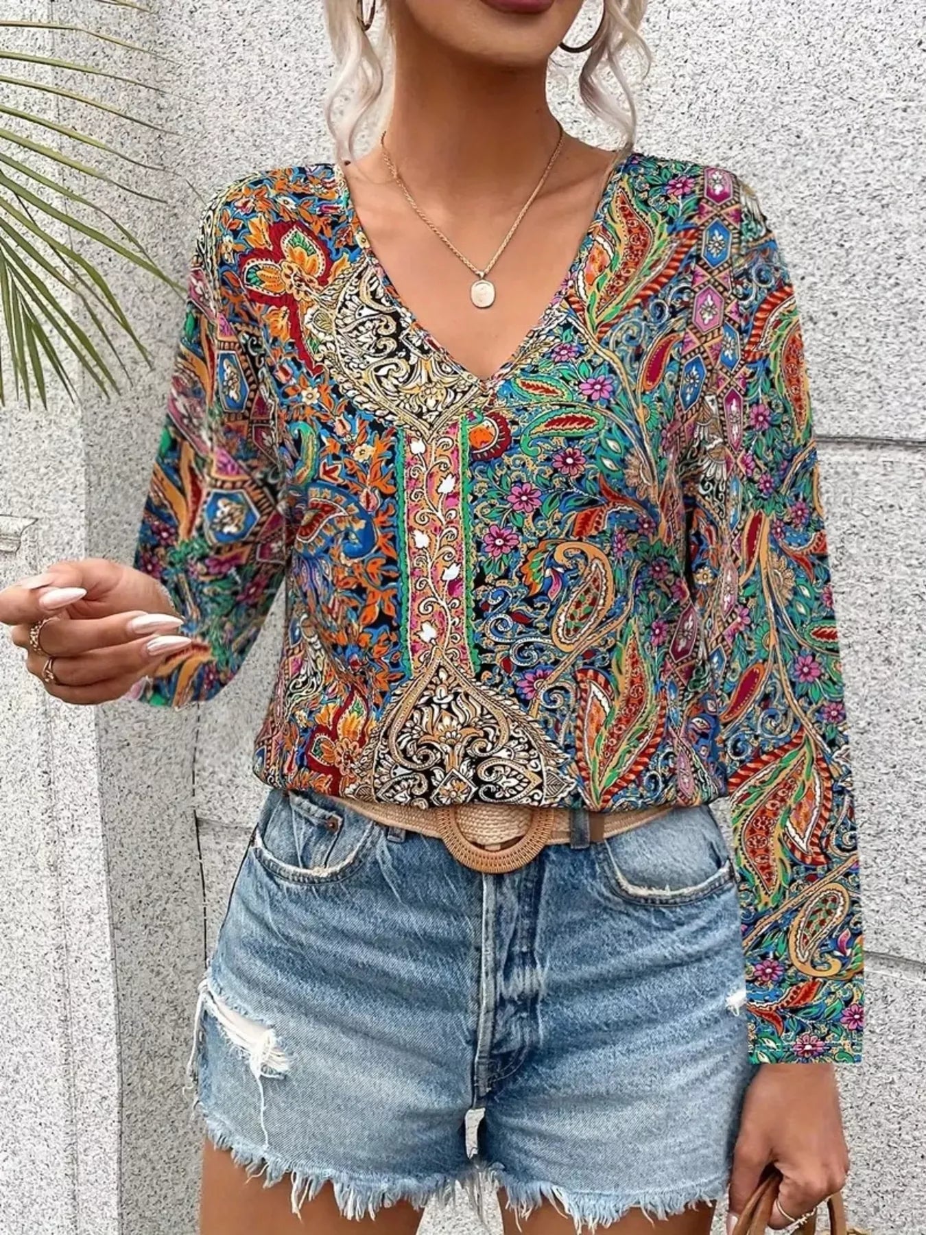 Multicolor paisley print V-neck long sleeve blouse, front view with button placket