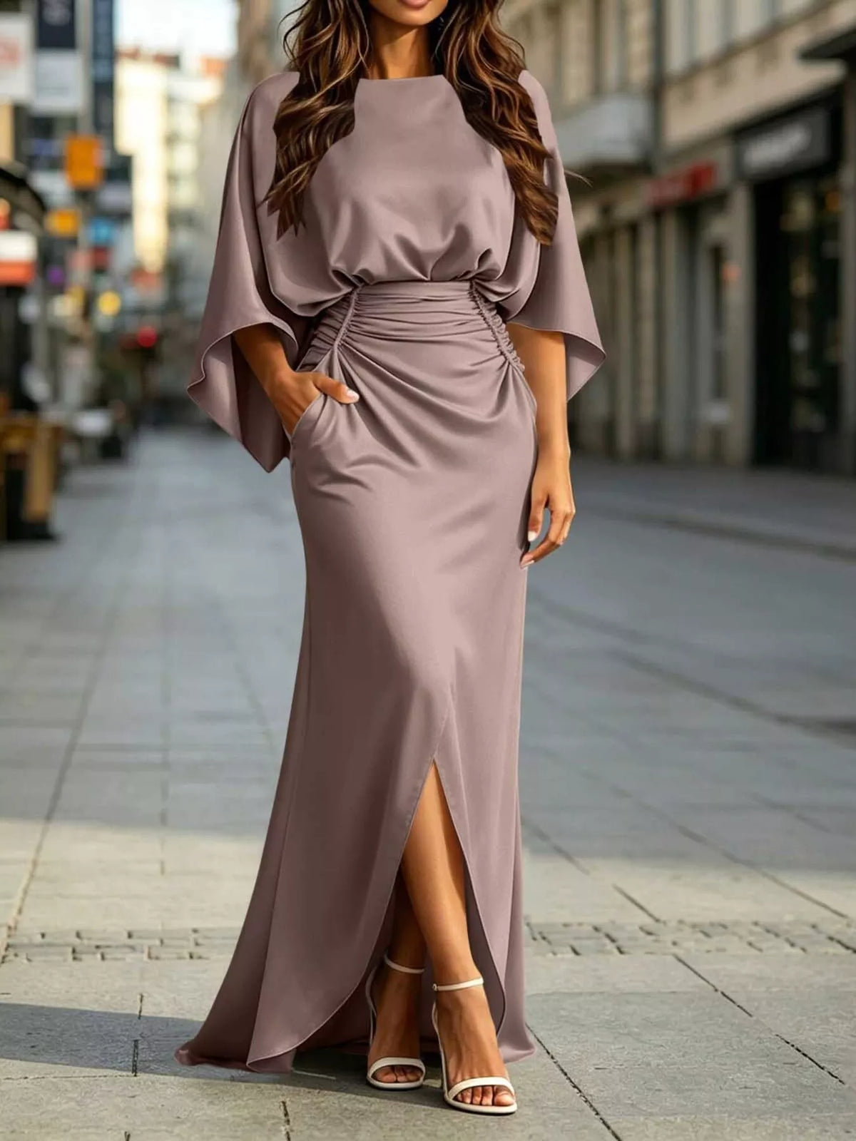 Taupe satin maxi dress with ruched waist, dolman sleeves, and front slit