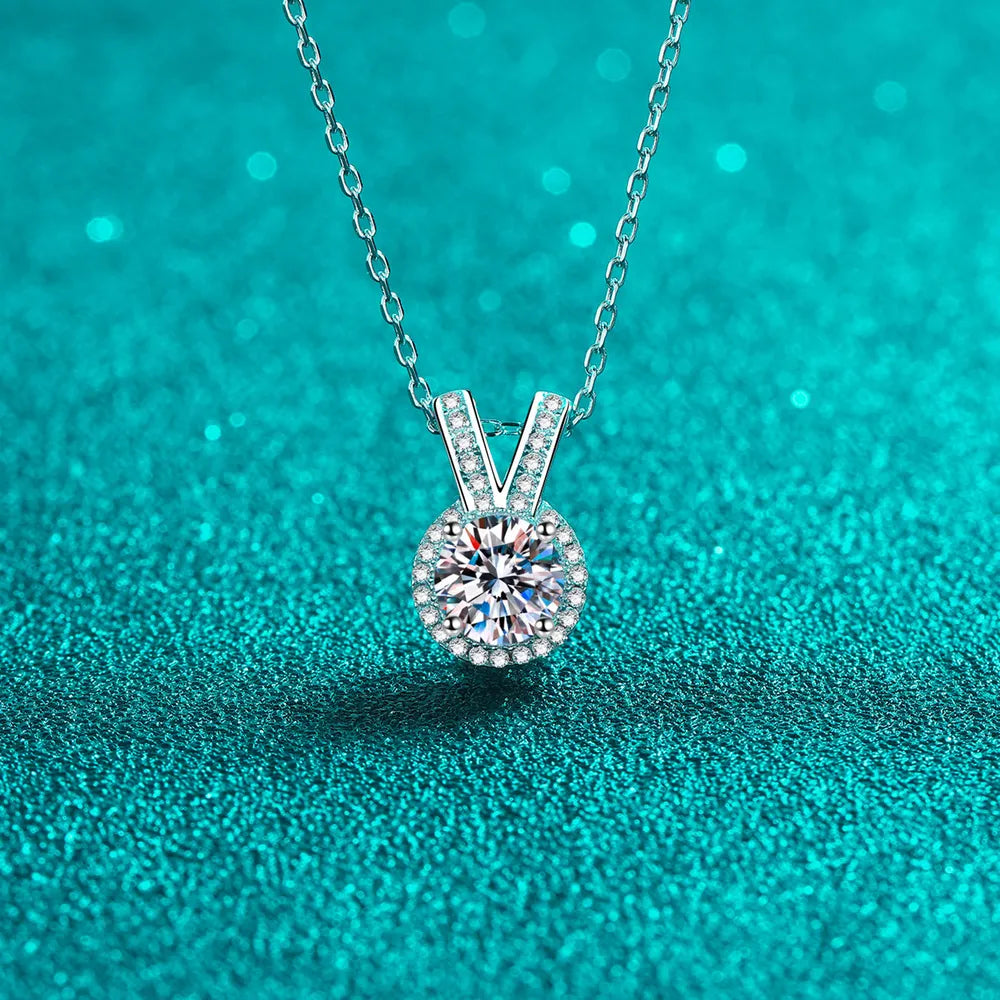 Silver rabbit-ear pendant necklace with round moissanite center and pavé accents