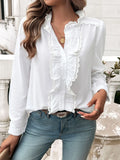 White long-sleeve button shirt with textured lace ruffle front and scalloped placket