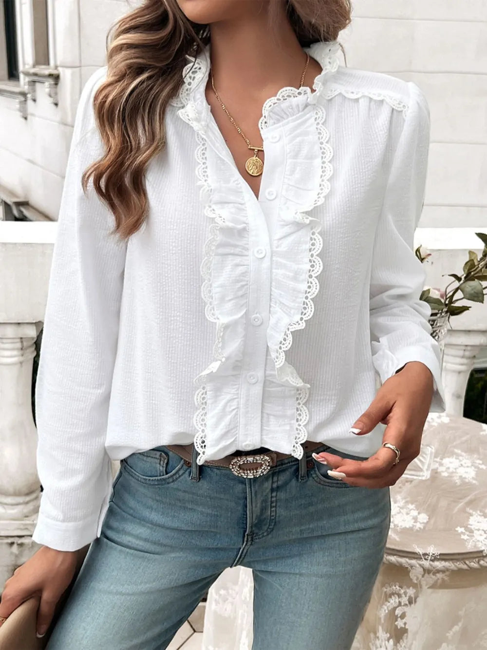 White long-sleeve button shirt with textured lace ruffle front and scalloped placket