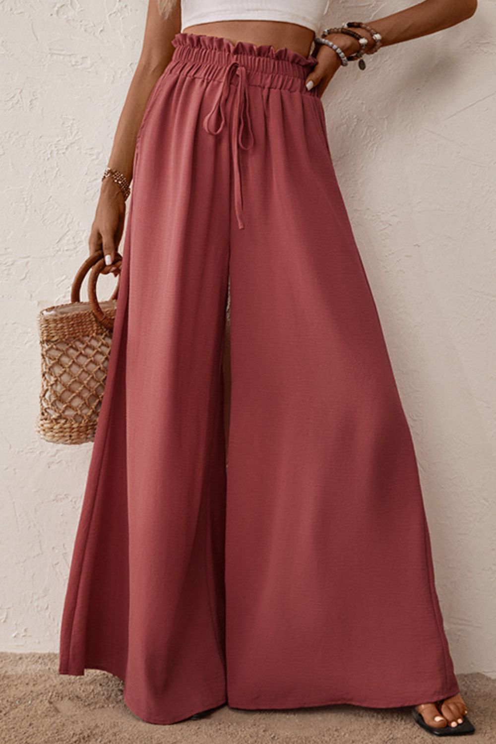 Deep red smocked paperbag waist wide-leg pants with drawstring ties
