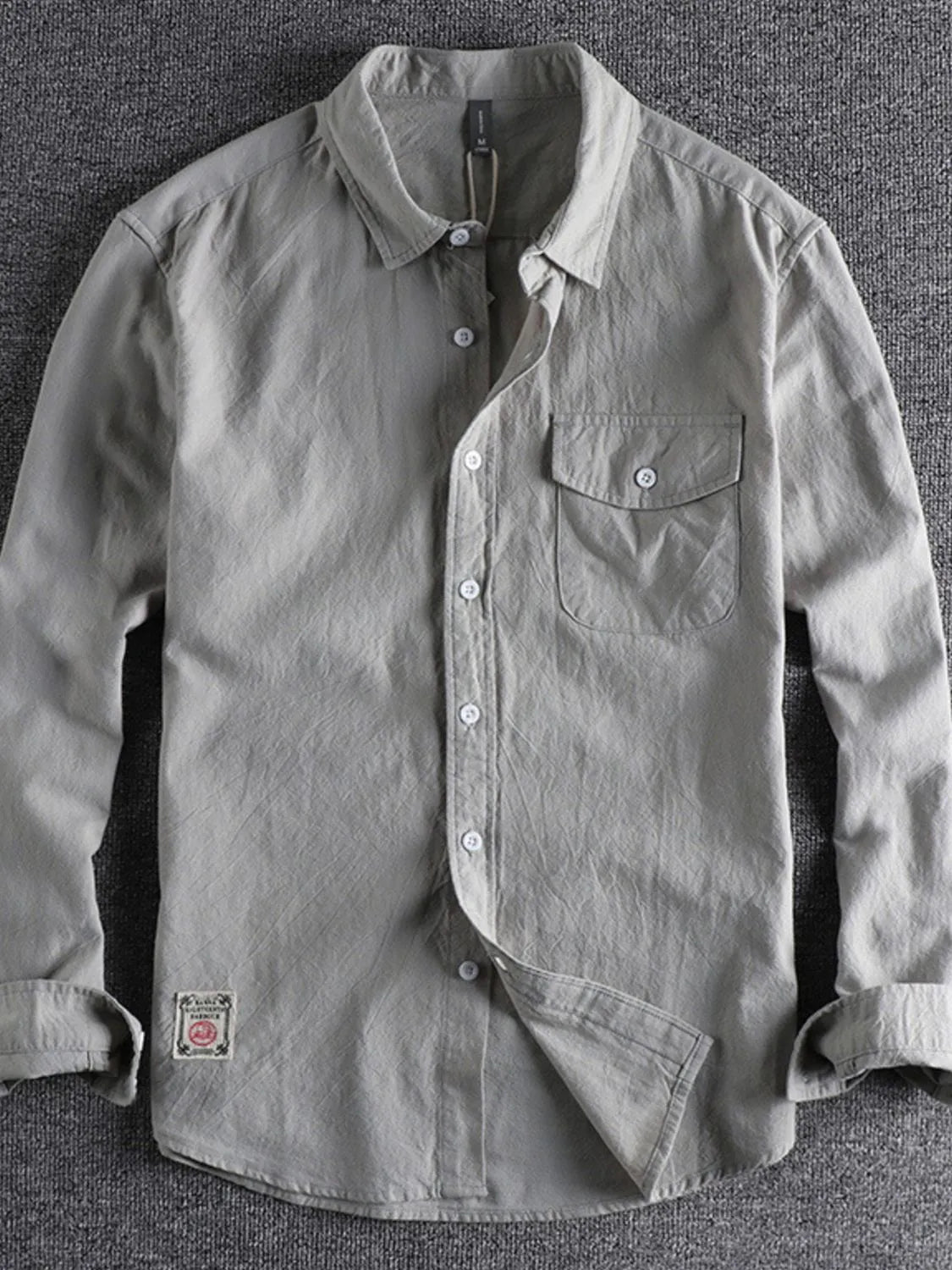 Men's button-down long sleeve shirt, light gray with chest pocket and button front
