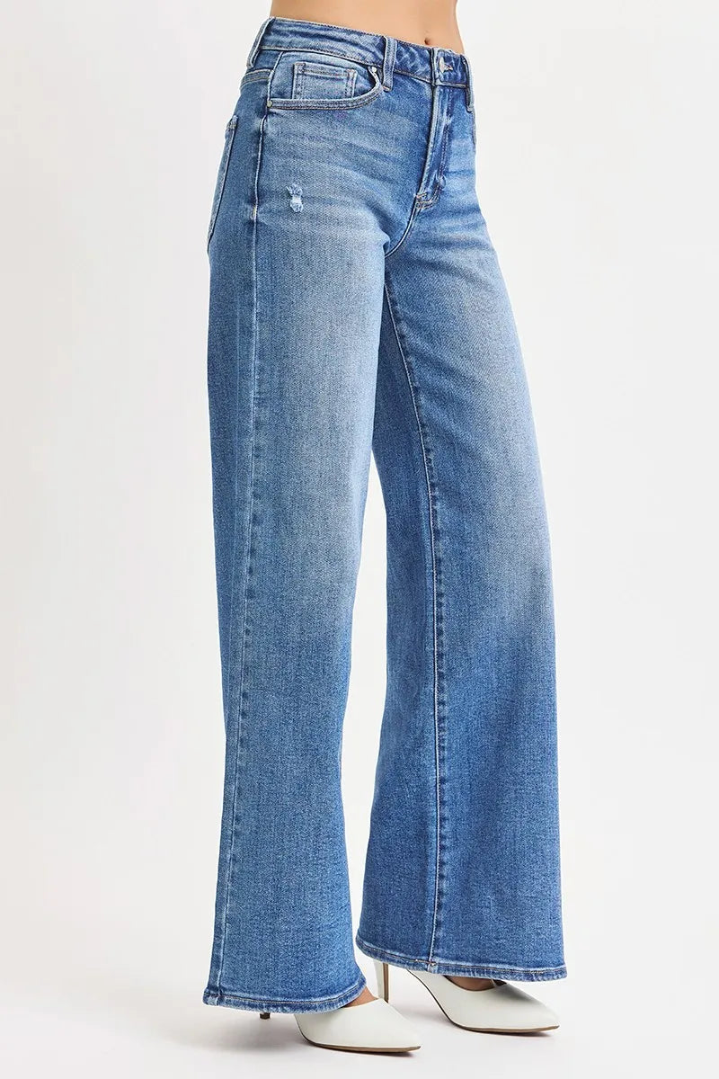 Medium wash high-rise wide-leg jeans, side view with long flared leg