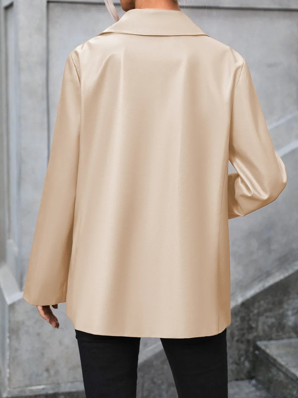 Tan button-up blazer back view with collared neckline and long sleeves
