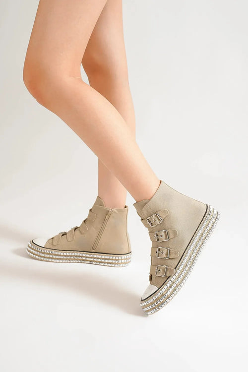 Khaki high-top platform sneaker with studded sole and multi-buckle ankle straps