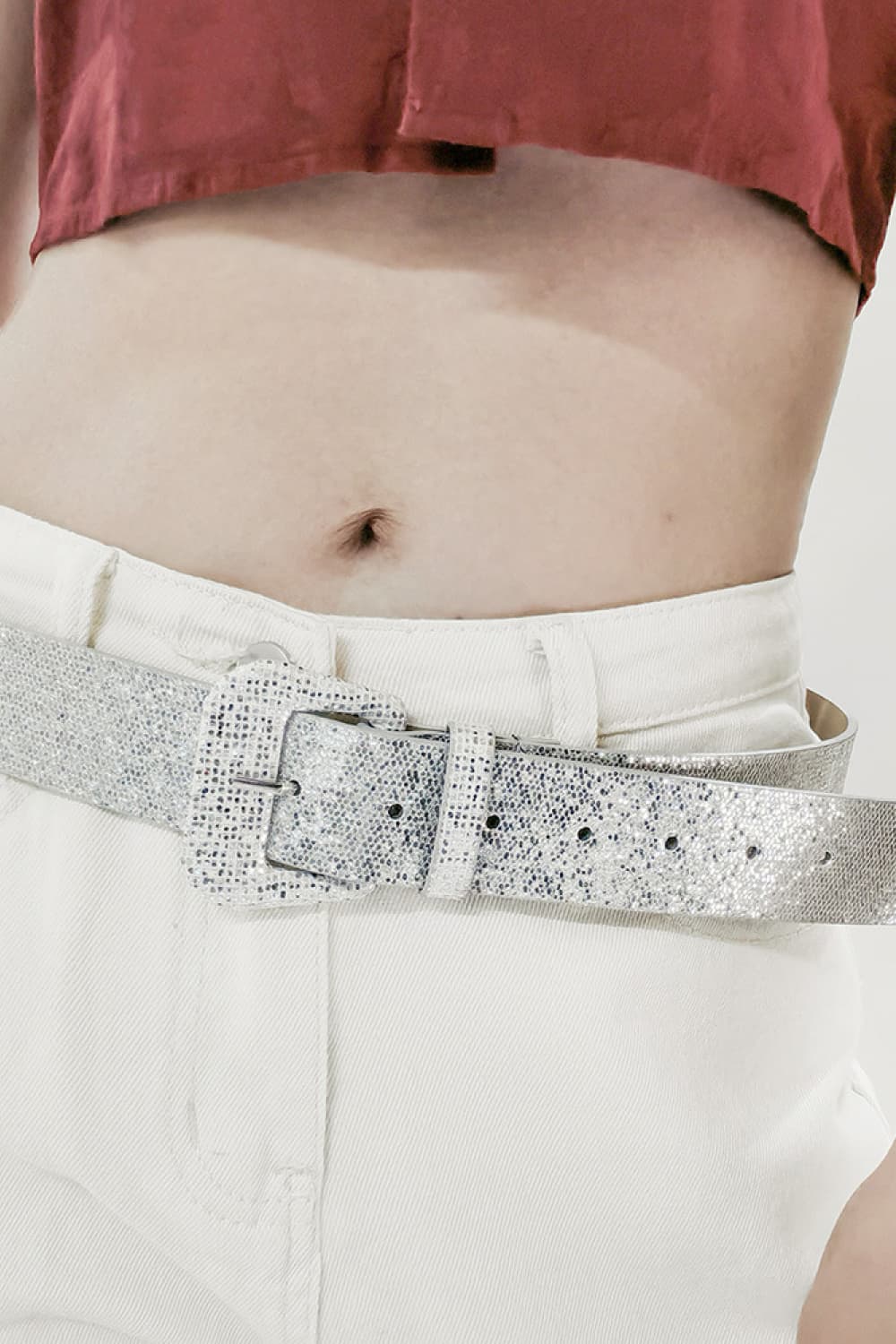 White glitter vegan leather belt with speckled texture and square buckle
