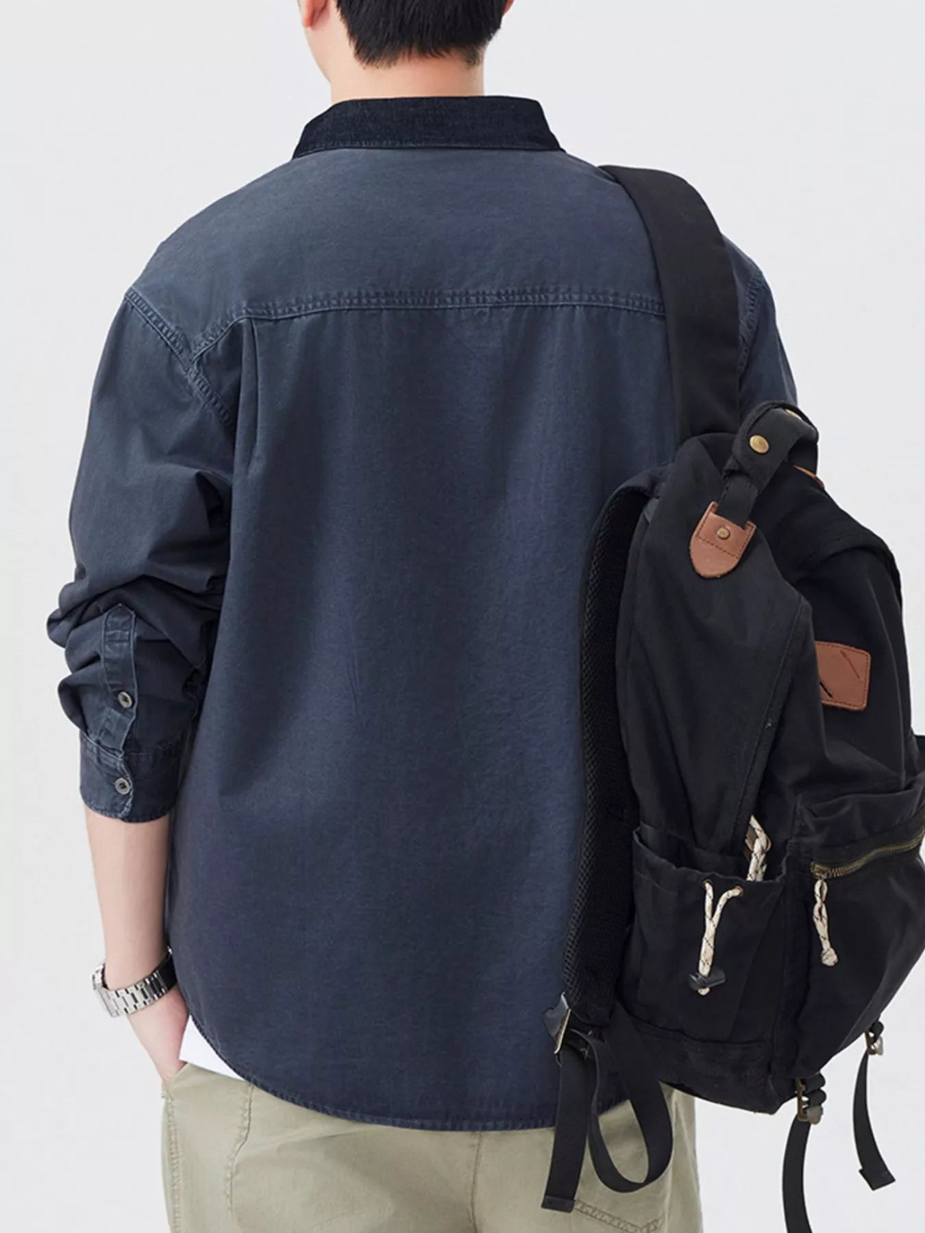 Dark gray men’s plus size button-up long sleeve shirt, back view with curved yoke