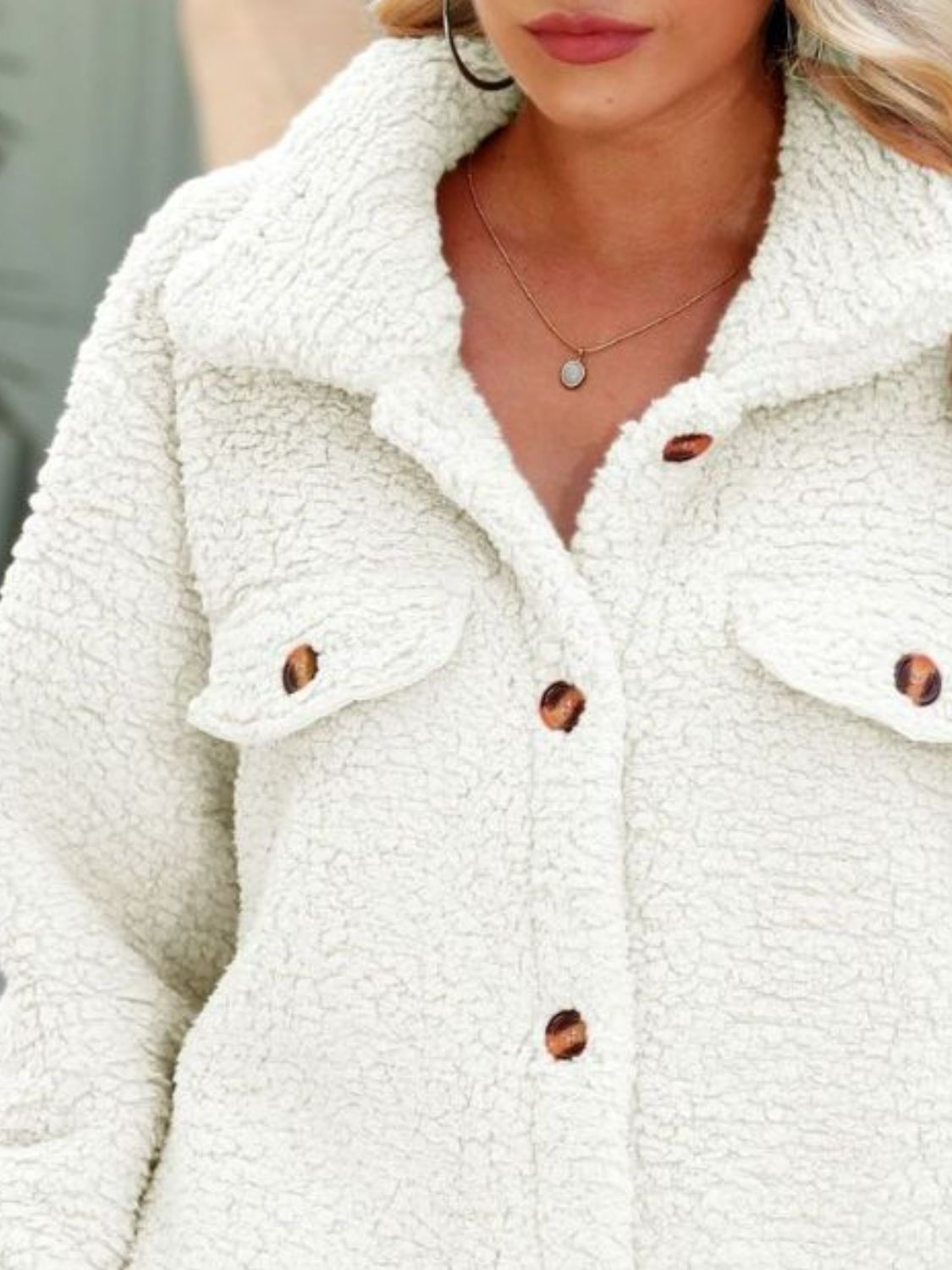 White textured collared coat with button placket and flap chest pockets