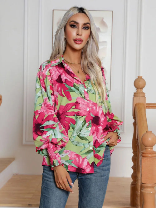 Floral button-down long sleeve shirt with hot pink, green, and light accents; full front view
