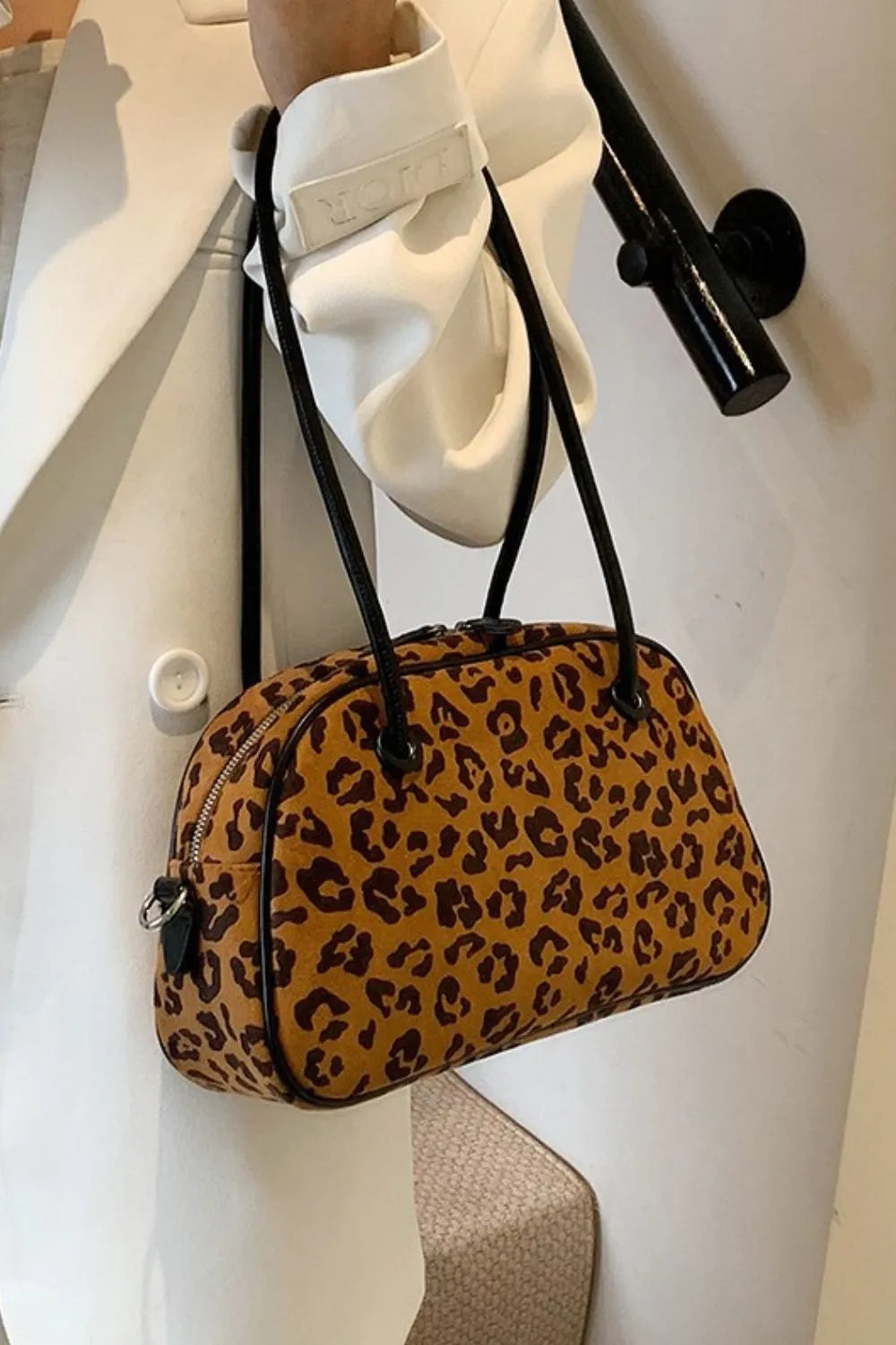 Caramel leopard suede medium shoulder bag with adjustable black crossbody strap