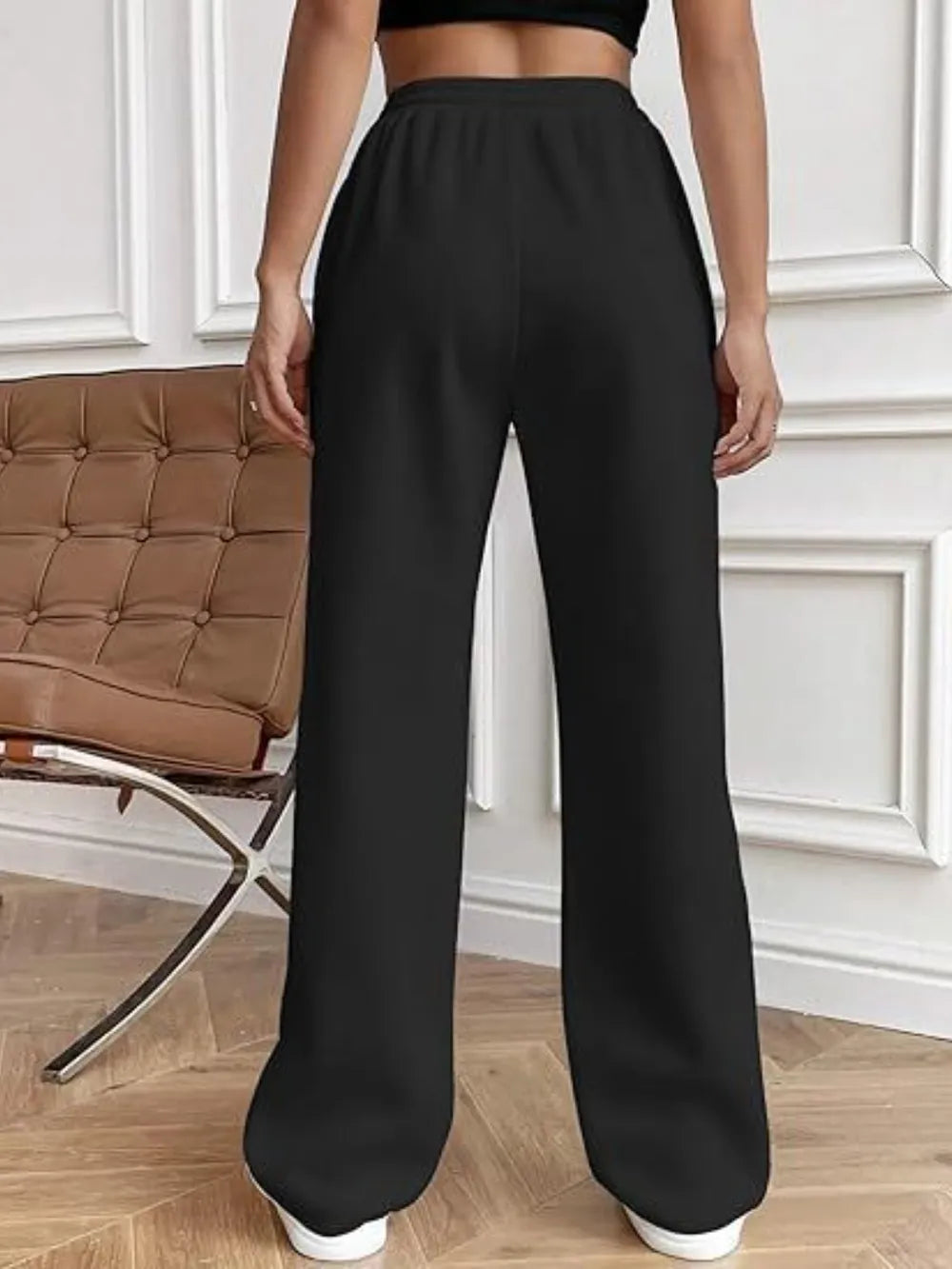 Black wide-leg pants with drawstring waistband and side pockets