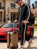 Black zip-up tracksuit jacket and striped track pants set, ribbed cuffs and hem