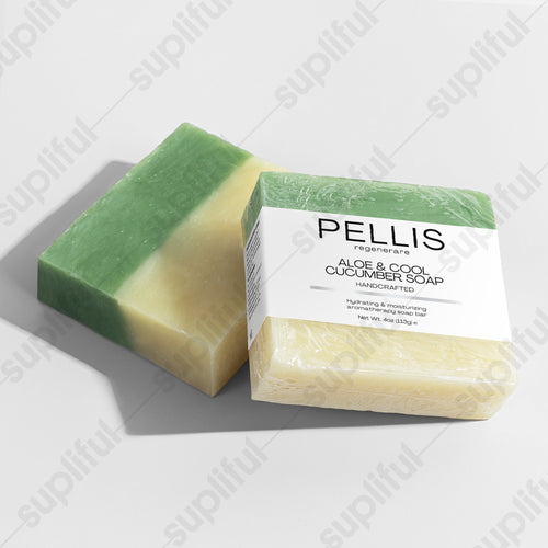 Handcrafted soap bars, green top and pale yellow base, one with white label