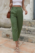 Green cropped straight-leg pants with front pockets and high waist