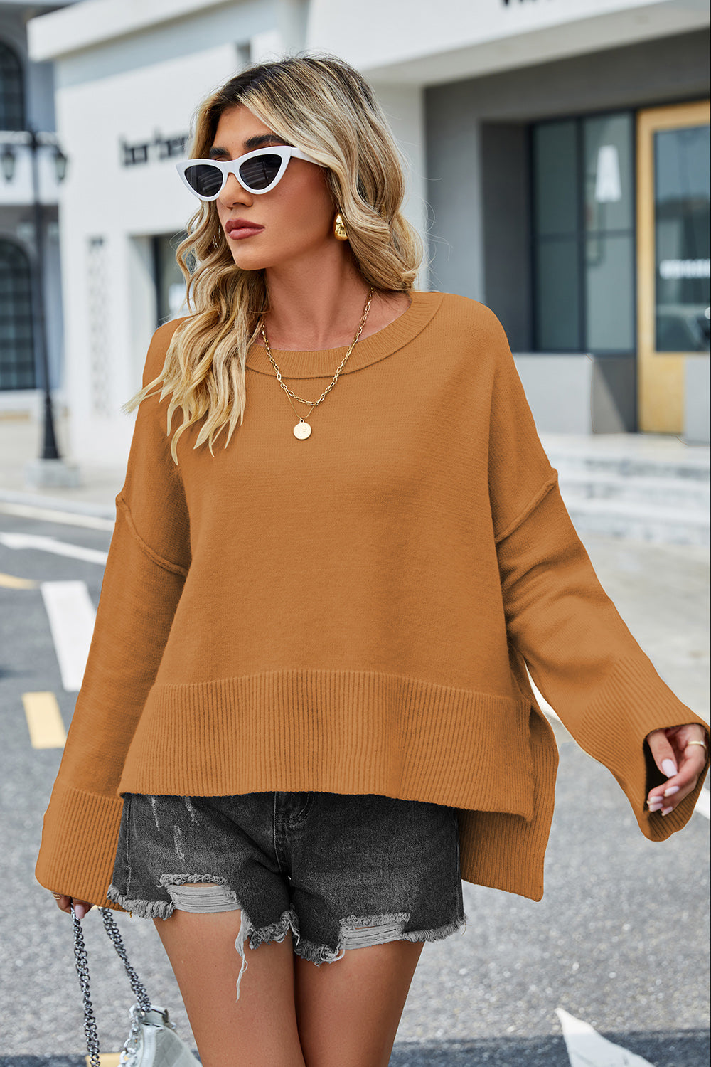 Ochre round-neck dropped-shoulder sweater with ribbed hem and wide sleeves