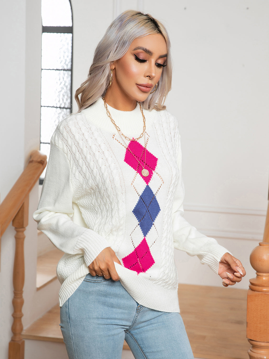 White openwork geometric mock neck sweater with long sleeves and diamond motif