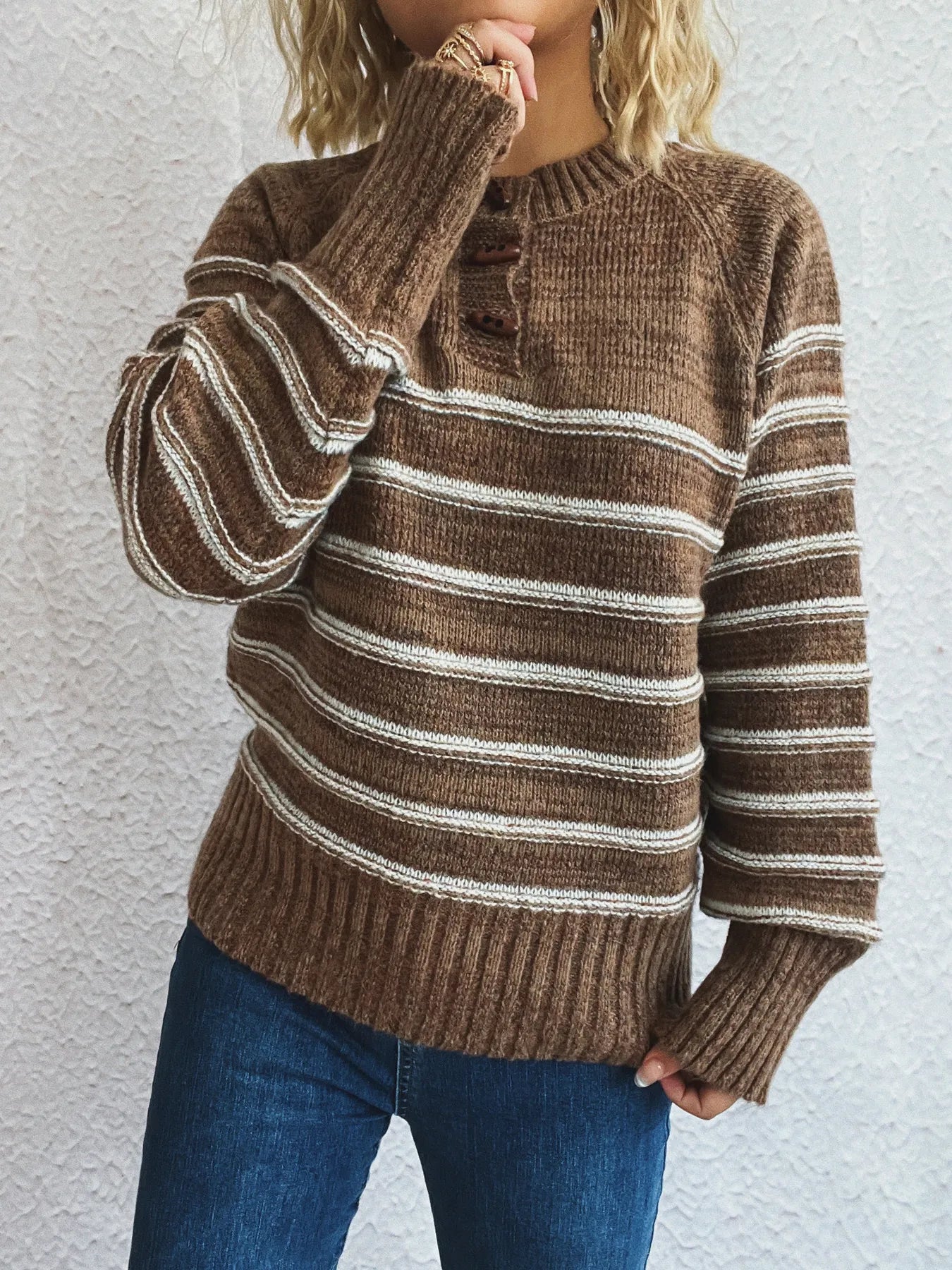 Brown striped long sleeve sweater with henley button placket and ribbed cuffs