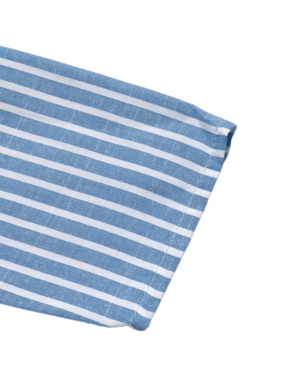 Close-up swatch of blue-and-white striped fabric with folded edge.