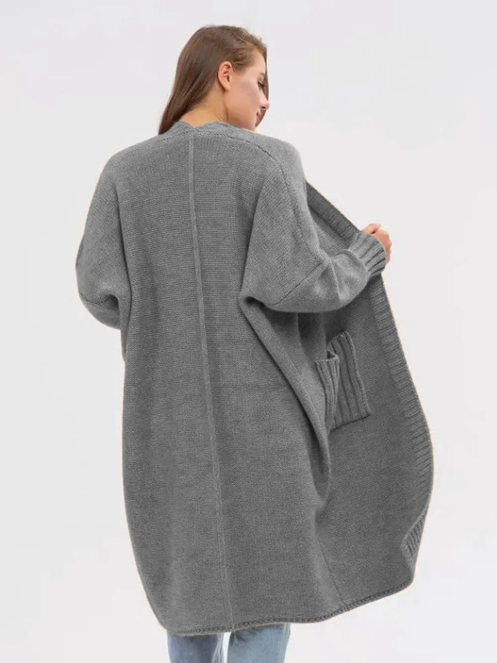 Gray longline cardigan back view with patch pockets and ribbed sleeve cuffs