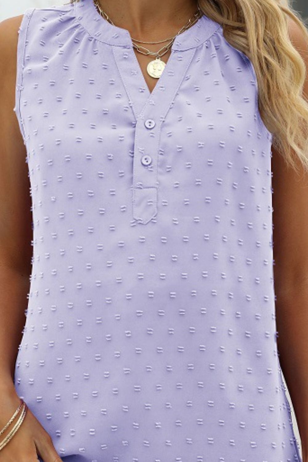 Lilac Swiss-dot notched neck sleeveless tank close-up with button front