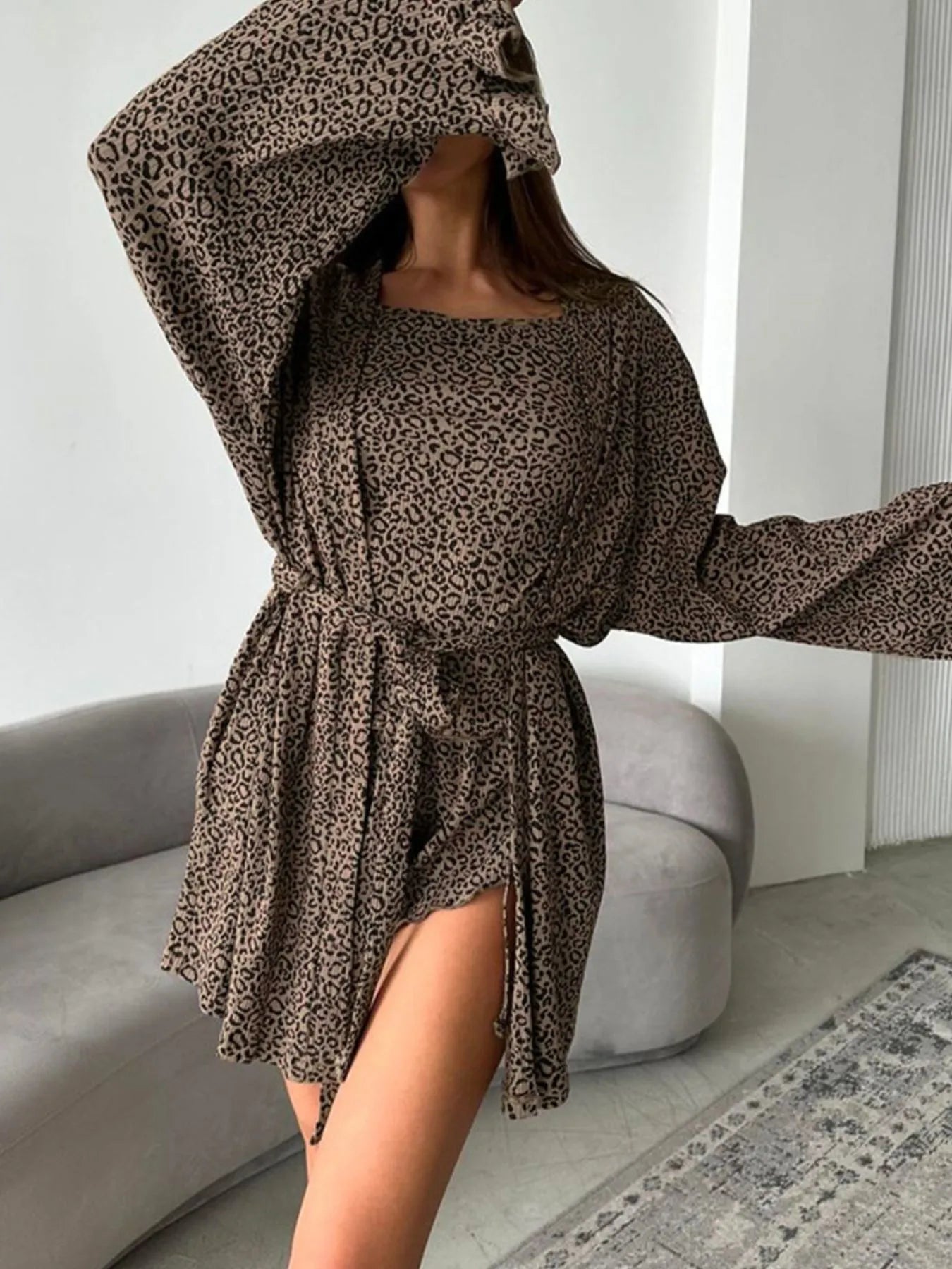 Leopard print cami with long flared cardigan and tie waist detail