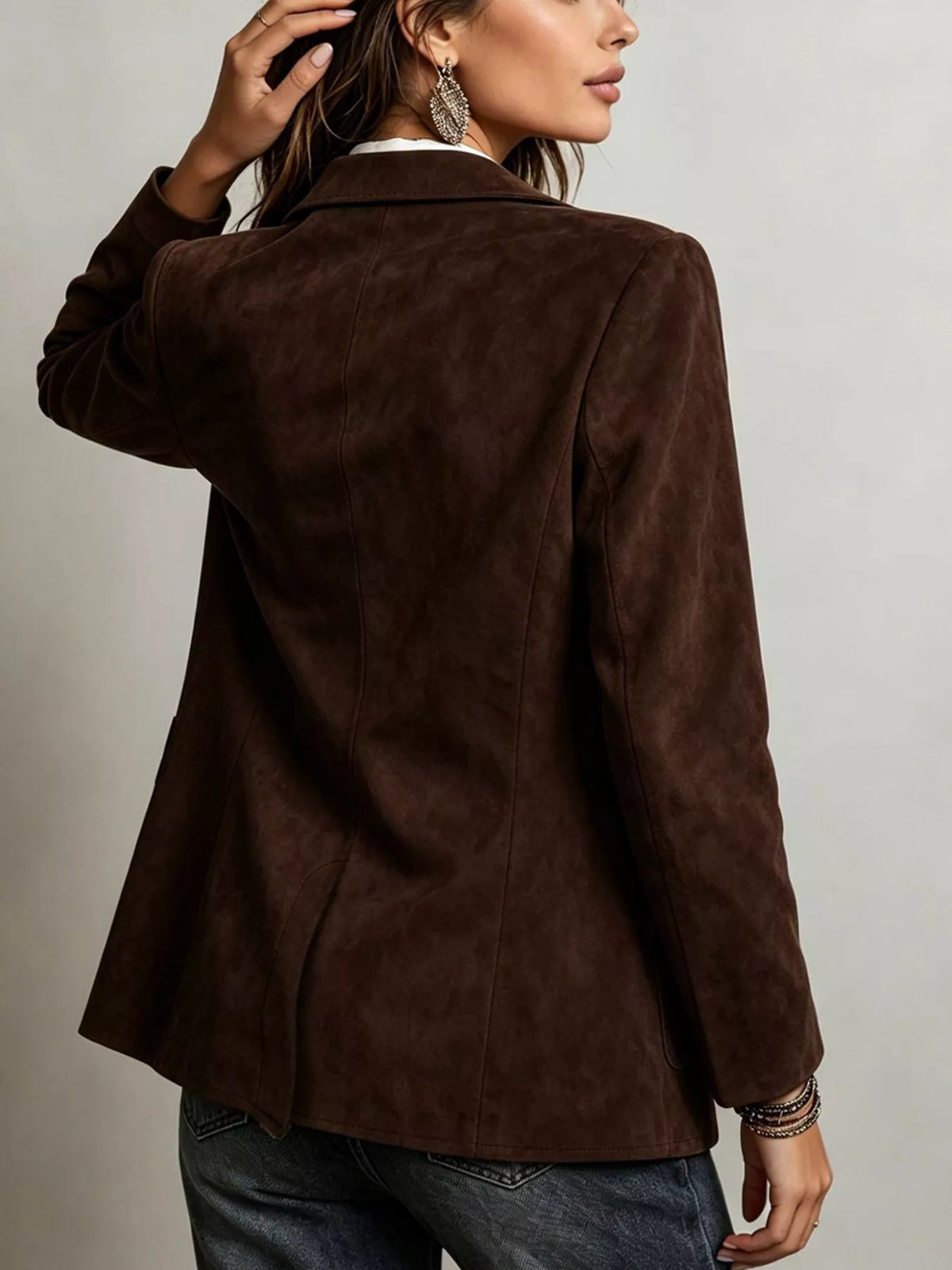 Dark brown suede single-breasted blazer jacket, back view with curved seams