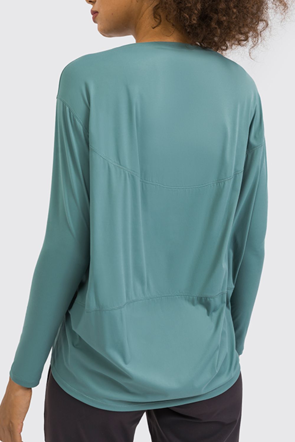 Teal loose fit active top, long sleeves with back seam details