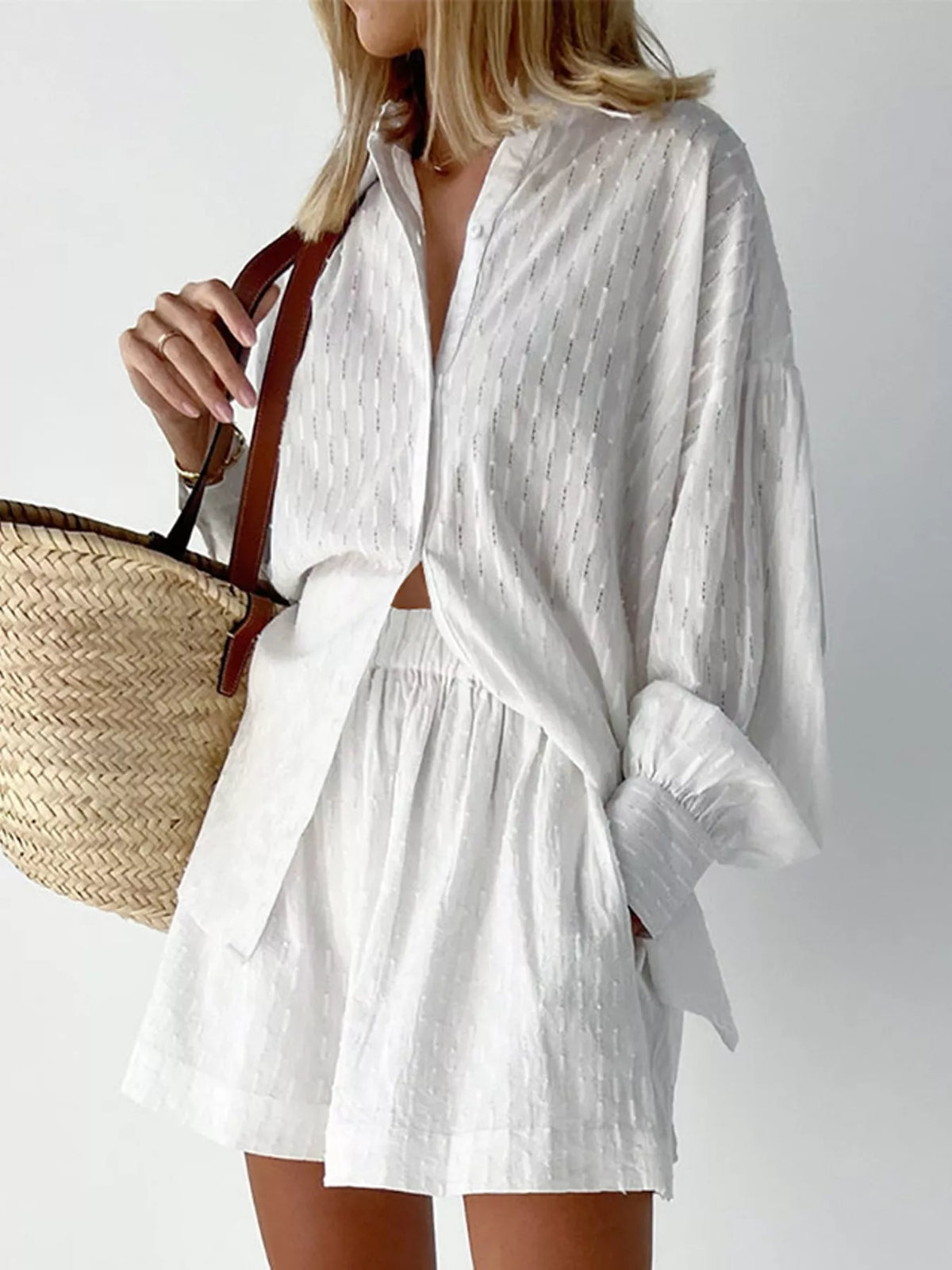 White textured button-down shirt and matching shorts set, long sleeves with bow-tied waist